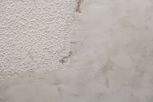 Popcorn ceiling removal in progress