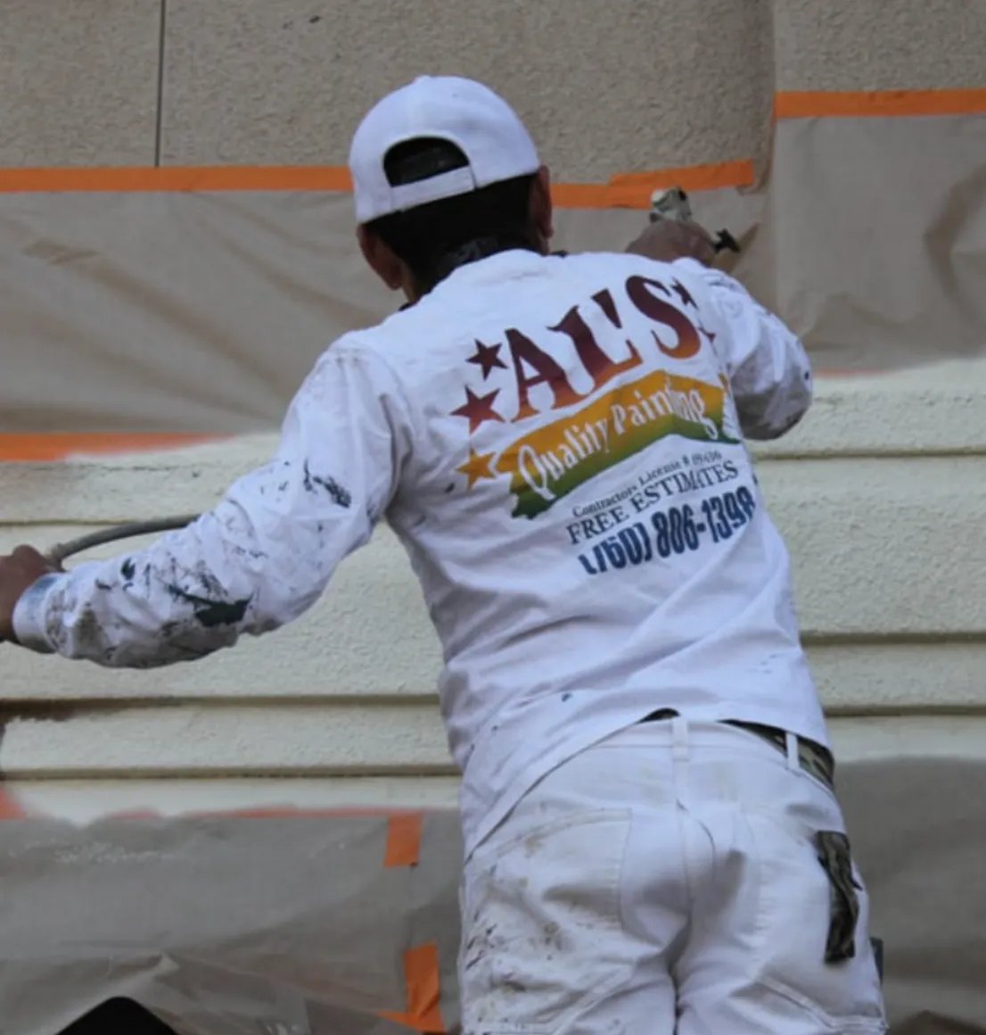 AL's Quality painter at work on a home exterior in North County San Diego